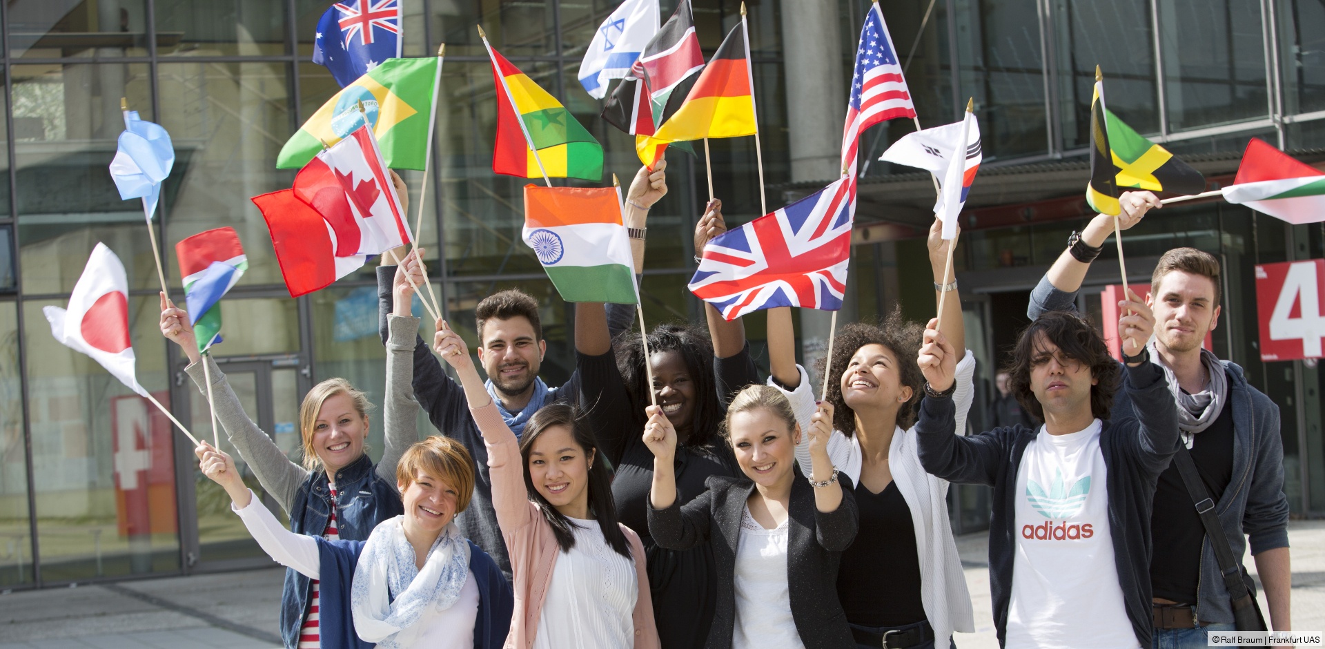 students waving flags