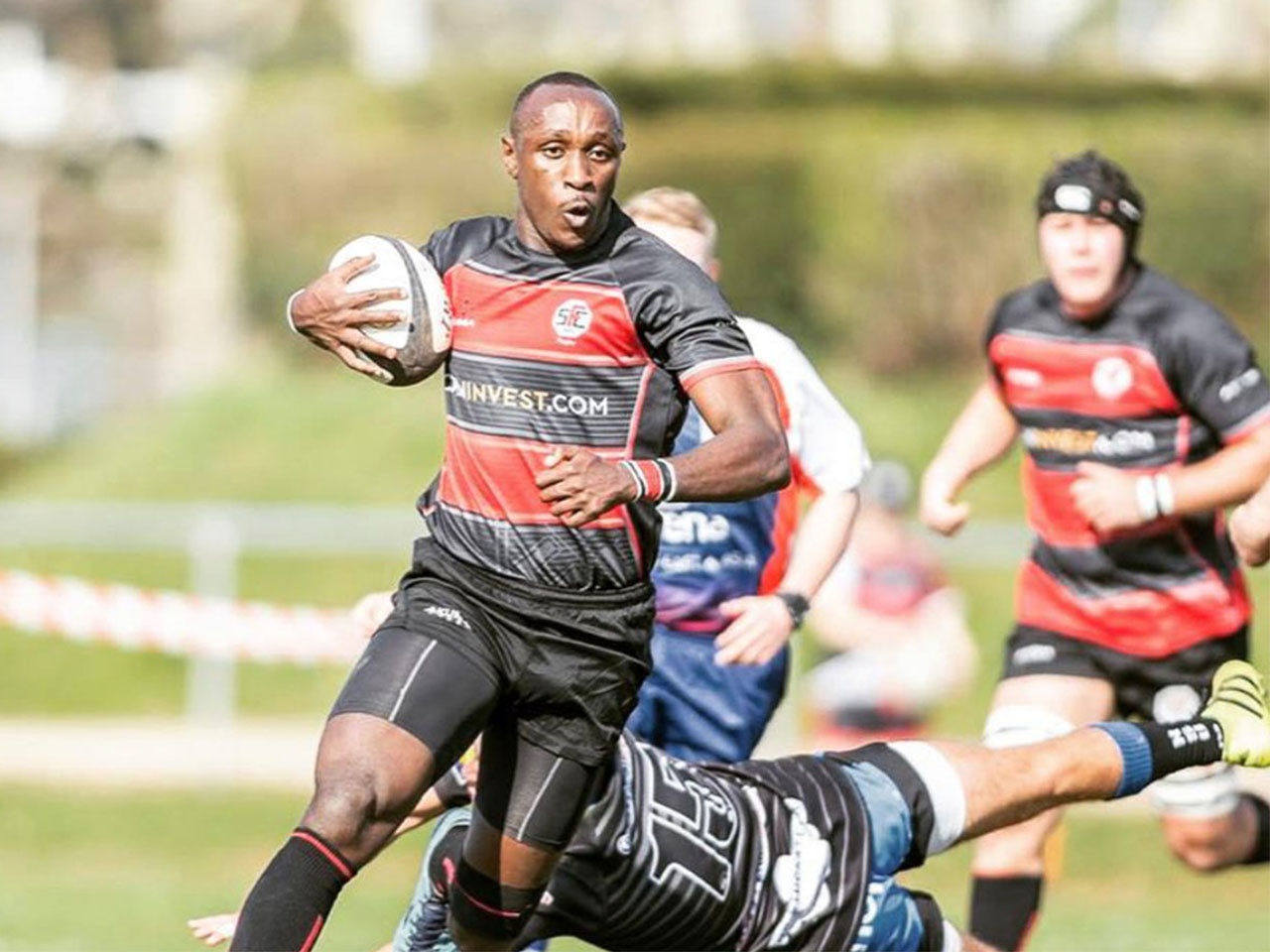 © Ian Mijire Rugby player Ian Minjire in action